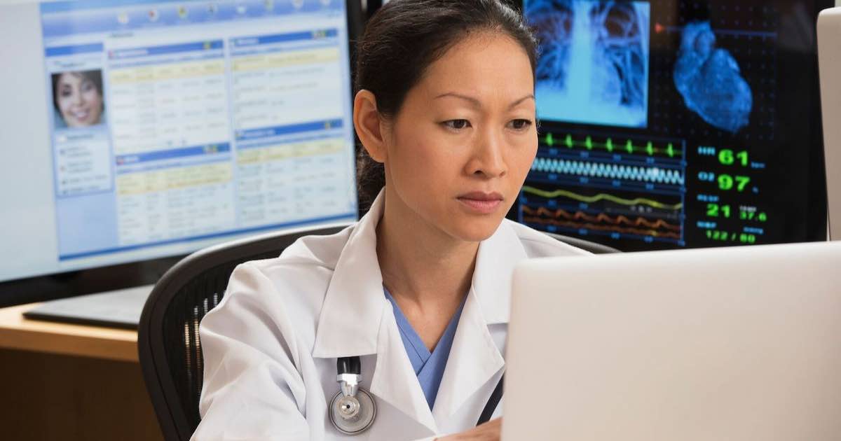 Doctor using computer
