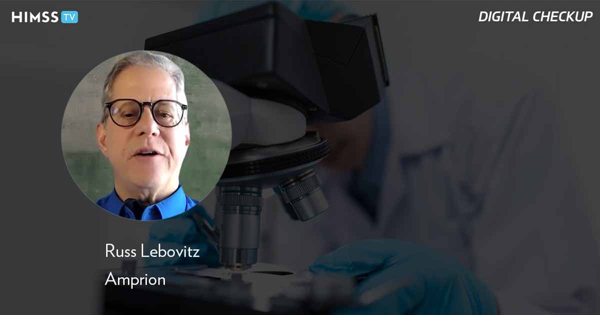 Russ Lebovitz, AmprionScientist_using microscope Photo by Chokniti Khongchum/pexels