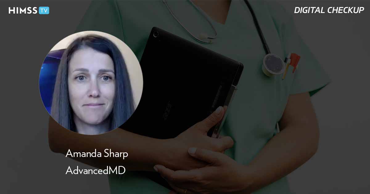 Amanda Sharp, AdvancedMD_Doctor holding tablet Photo by Kaboompics/pexels
