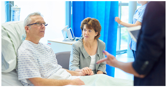 Doctor talking to patient