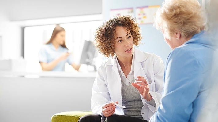 Doctor talking to patient