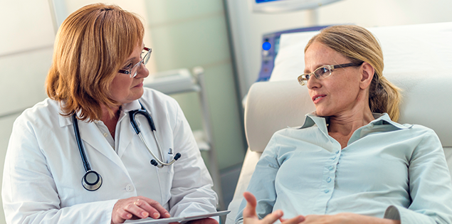 Doctor talking to patient