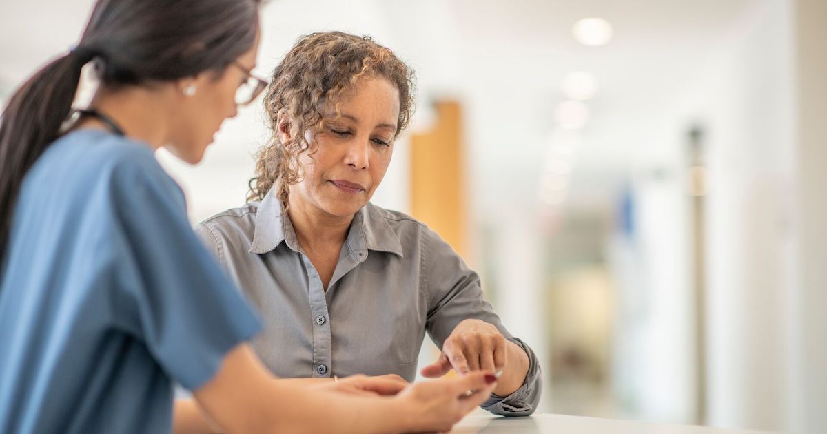 Doctor explains results to patient
