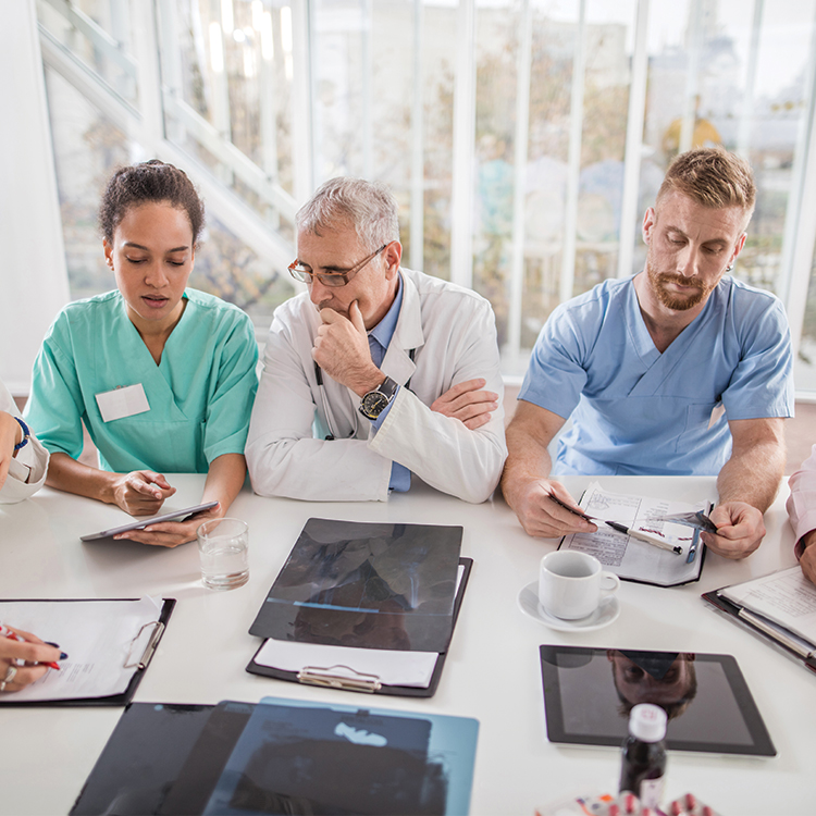 Nurses talking to Doctor