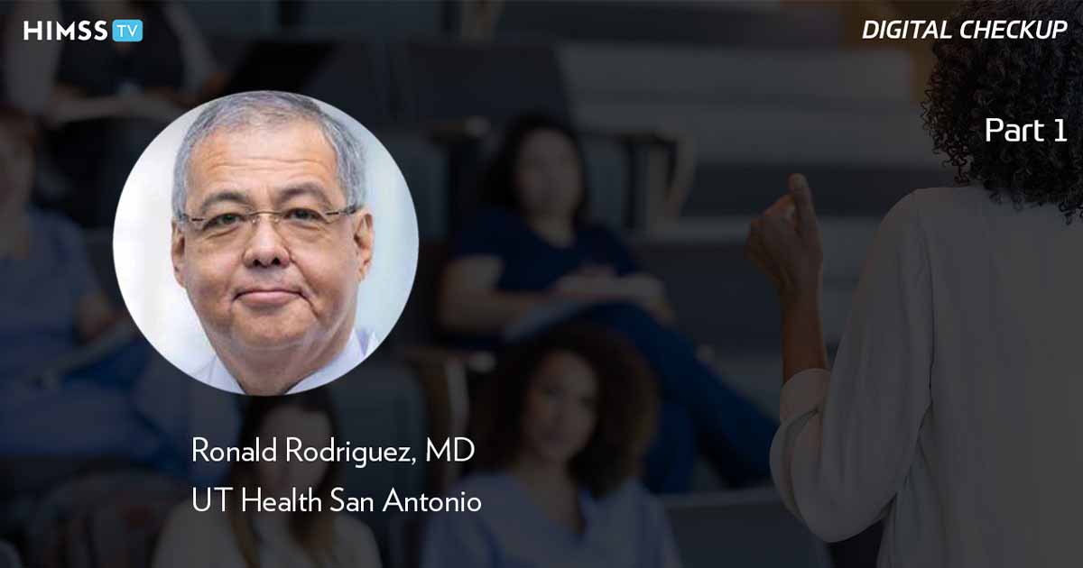 Dr. Ronald Rodriguez, UT Health San Antonio_Professor giving lecture in students in scrubs Photo by Steve Debenport/Getty Images