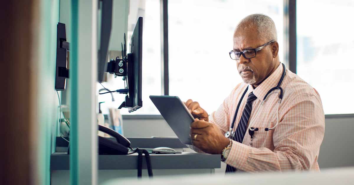 Doctor using tablet