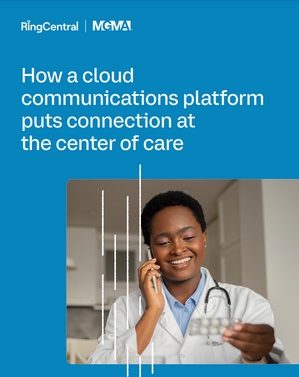 Healthcare worker talking on the phone and looking at pack of pills