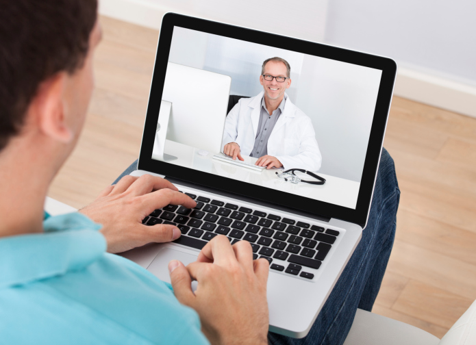 doctor on video call with patient
