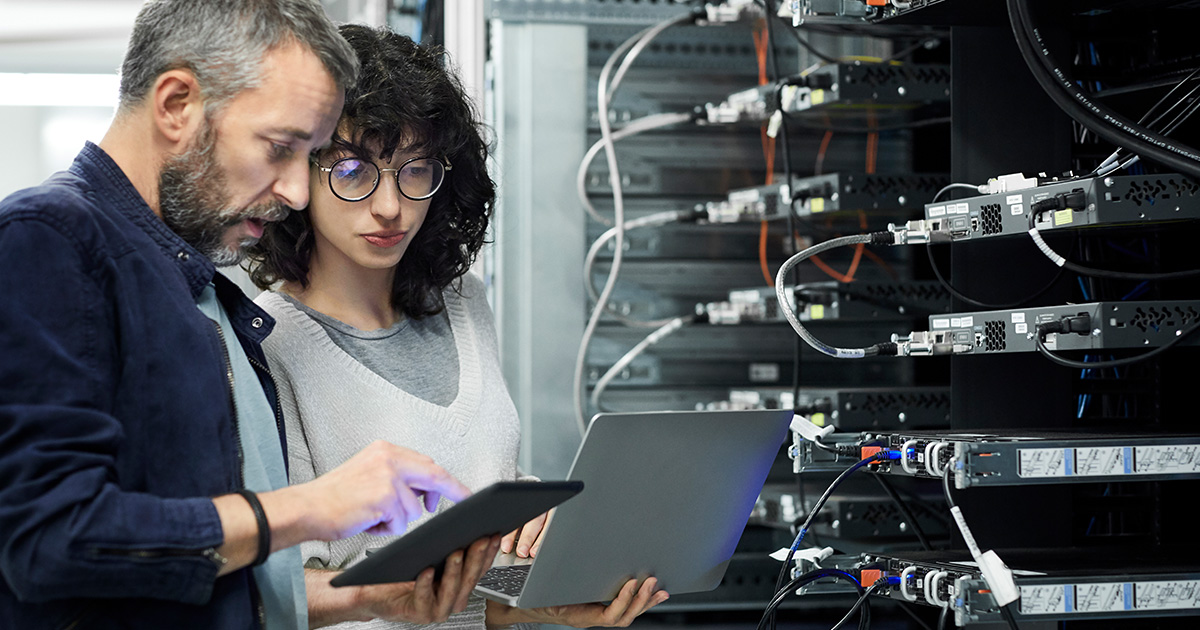 IT and cybersecurity leaders in server room
