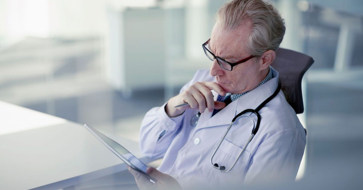 Independent physician consults patient notes