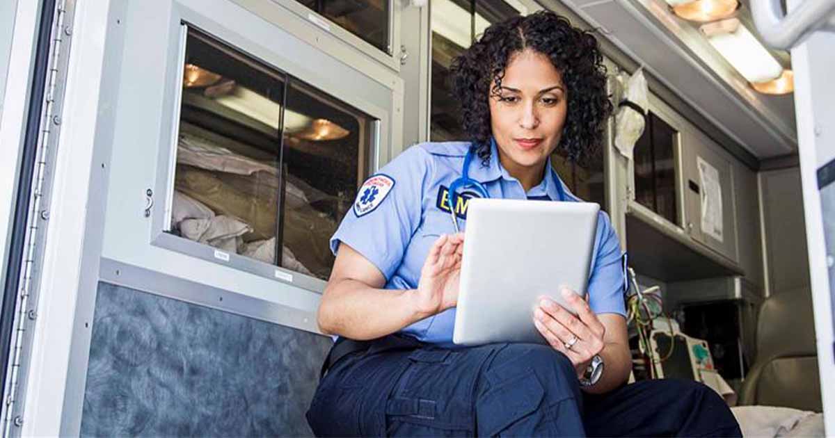 Paramedic using tablet