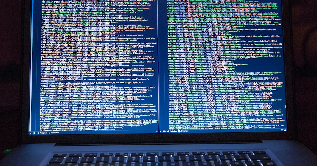 Code on two side-by-side vertical screens