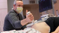 Physician doing ultrasound at Children's Hospital Colorado
