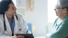 Doctor talking to patient