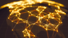 Black map of U.S. lit up with data connectivity in bands of gold light