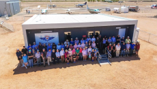 William Creek town community members, RFDS stakeholders, and Health and Aged Care Minister Mark Butler during the opening of the RFDS William Creek Community Health Service