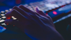 A hacker's hand on a keyboard