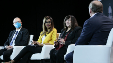 Panelists onstage at the HIMSS21 keynote