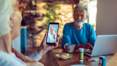 A couple consulting with a doctor via telemedicine