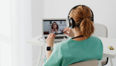 A clinician on a video call with a patient