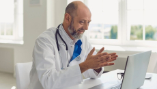 A doctor engaging a patient in an online consultation