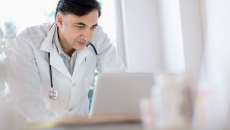 Physician at computer