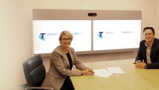 Telstra Health and HealthLink representatives following the signing of their sale deal