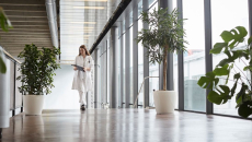 A doctor walking down a hallway