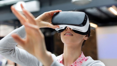 A person using a pair of VR glasses