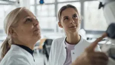 Healthcare workers looking at monitor