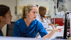 Nurses discussing new technology