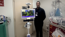 Harsha Gopinath of Prime Healthcare with a tele-sitter cart