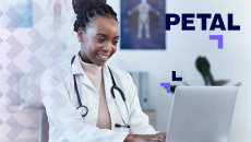 Doctor using laptop