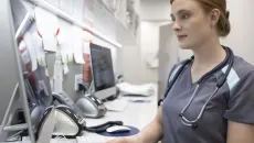 Healthcare worker using computer