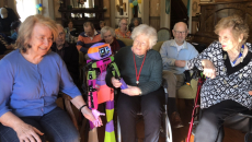 People interacting with a robotic companion