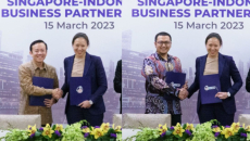 [Left] Ryanto Marino Tedjomulja, CIO, Siloam and [Right] Dr Seno Purnomo, Chief of Data and Information System, IDI with Dorothea Koh, CEO and co-founder, Bot MD, at a MOU Signing Ceremony in Singapore
