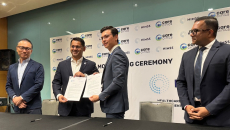 CareClinics and HIMSS representatives during an MOU signing