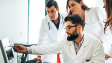 Group of healthcare professionals at a screen