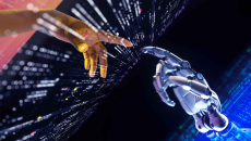 human hand touching robot hand through screen of data