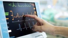 Electrocardiogram analysis represented by a reading on a screen