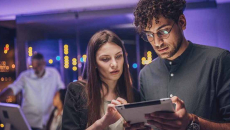 People looking at a tablet