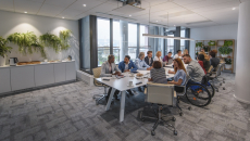 Health planners gathered at a table for a meeting