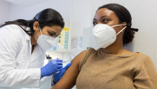 A patient getting a vaccine shot