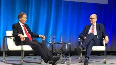 John Mackey, (left) CEO and cofounder of Whole Foods, speaks to Cris Ross, CIO Mayo Clinic, at HIMSS22 in Orlando.