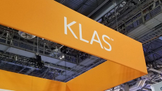 KLAS sign hangs above its HIMSS Global Conference exhibition