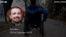 Karl Ulfers at DUOS_Wheelchair rider on sidewalk by FluxFactory / Creatas Video / Getty Images