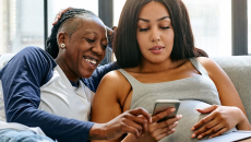 A couple accessing Monash IVF's digital front door