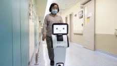 The wayfinding robot EDi guiding a visitor in the hospital