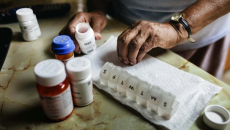 Person organizing pills