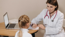 A child consulting with a doctor